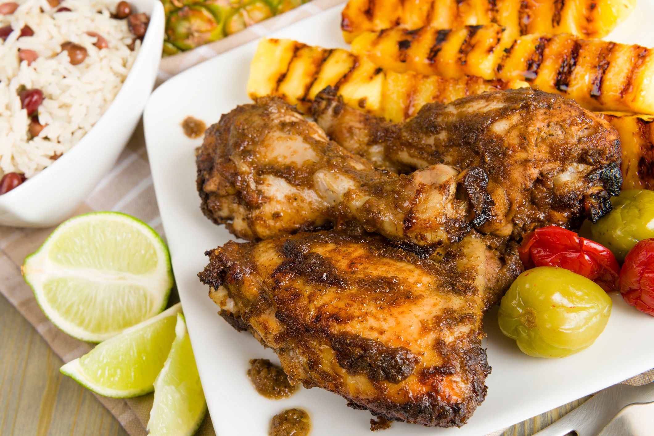 Jamaican jerk chicken party tray with Caribbean sides